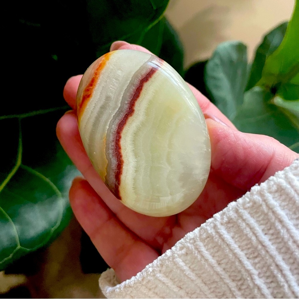 Banded green onyx palm stone. Super smooth